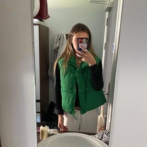 Green sixth June vest